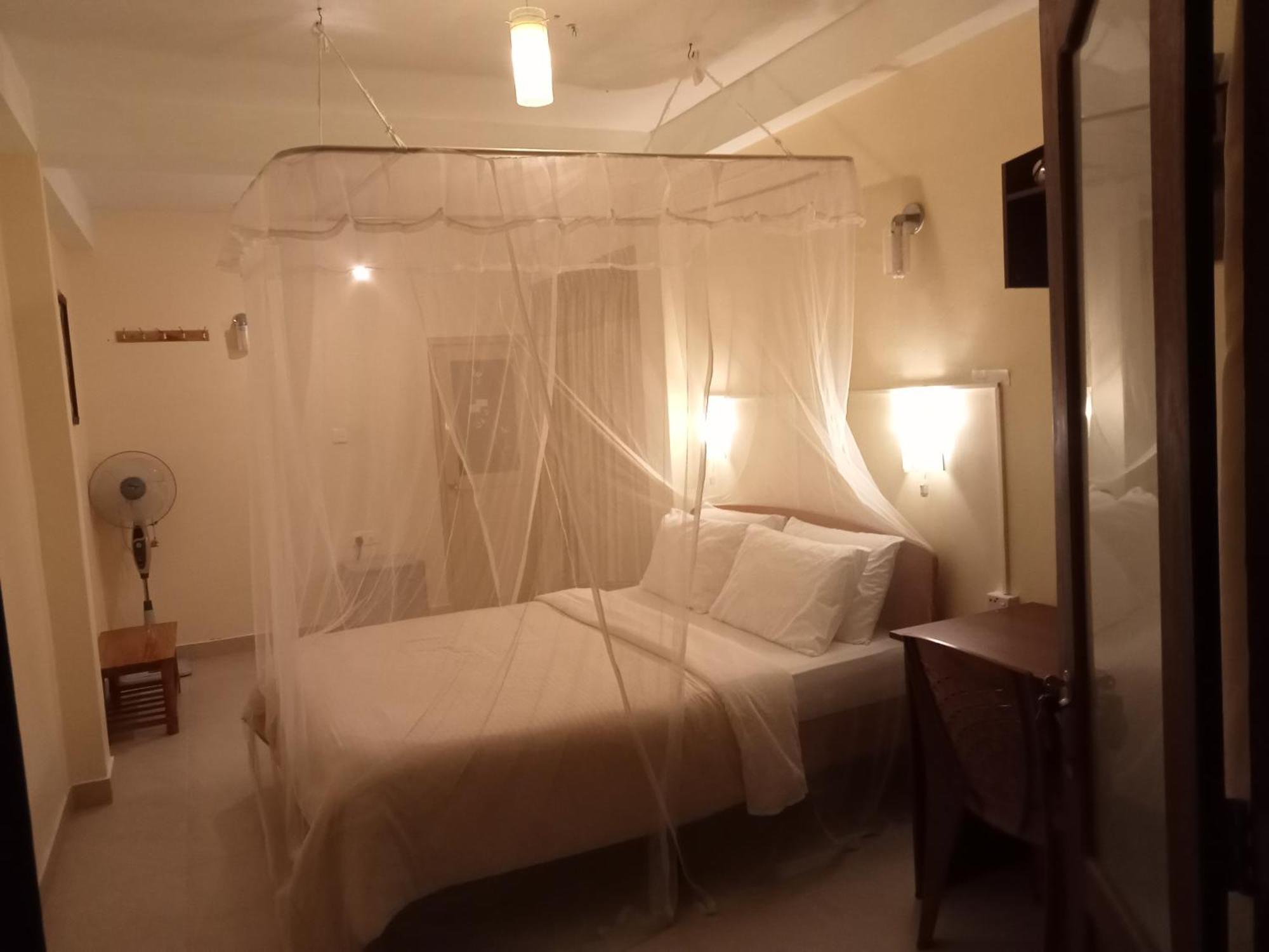 Welcome Inn Ella Quarto foto